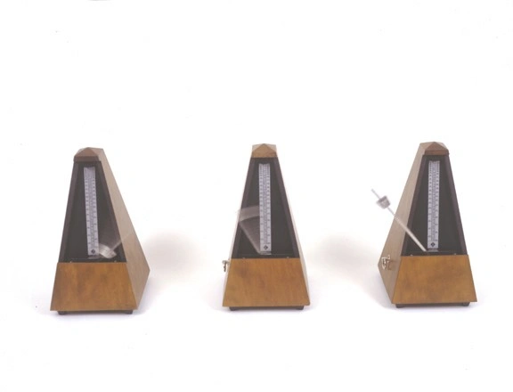 Work No. 223, three metronomes beating time, one quickly, one slowly, and one neither quickly nor slowly by Martin Creed